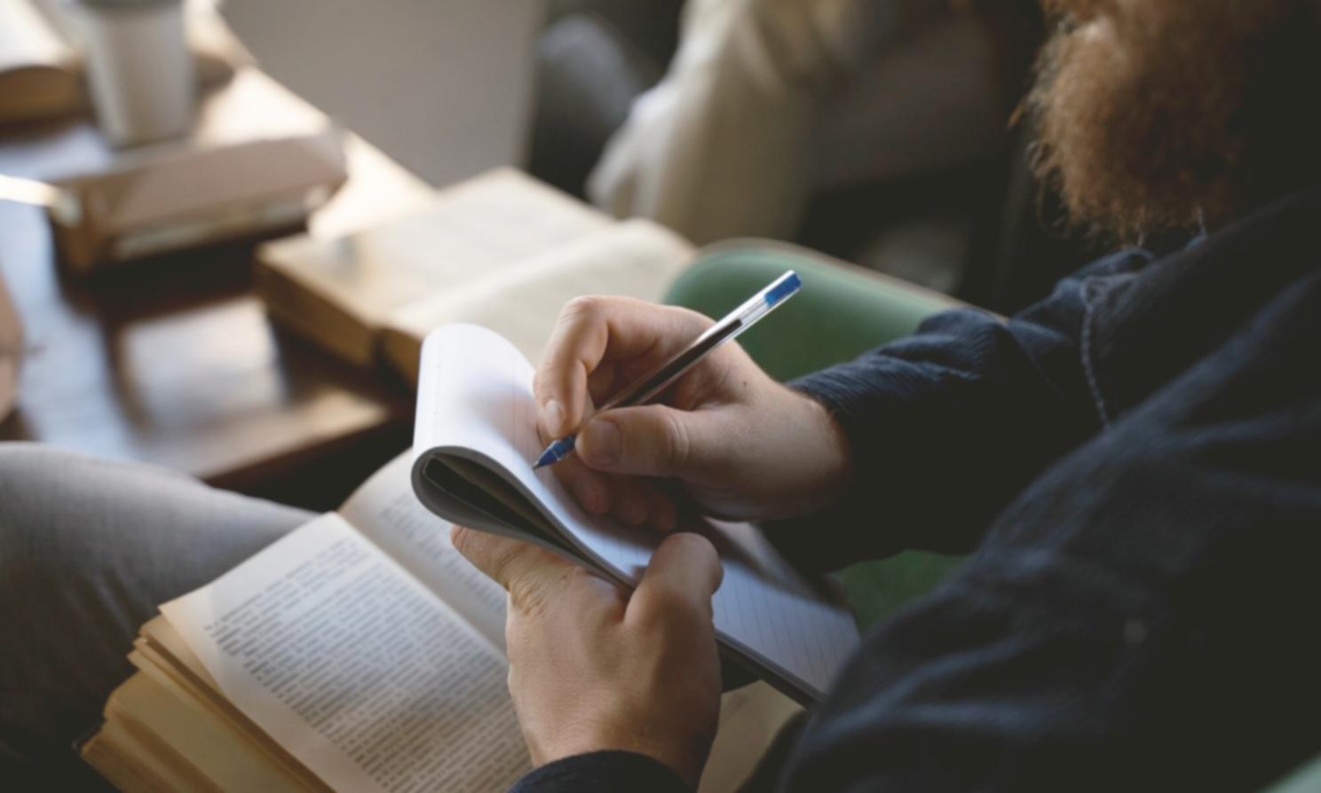 Students reviewing financial charts during analysis workshop